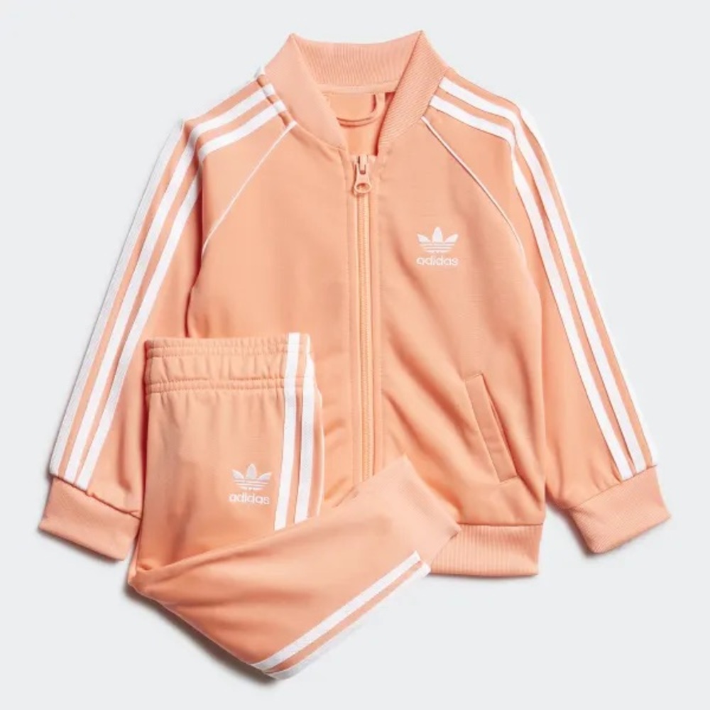 Coral/pink-orange Adidas women’s tracksuit pants